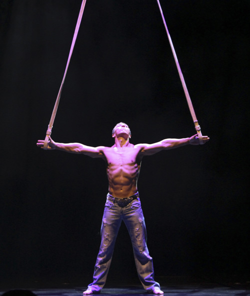 aerial gymnast on the straps